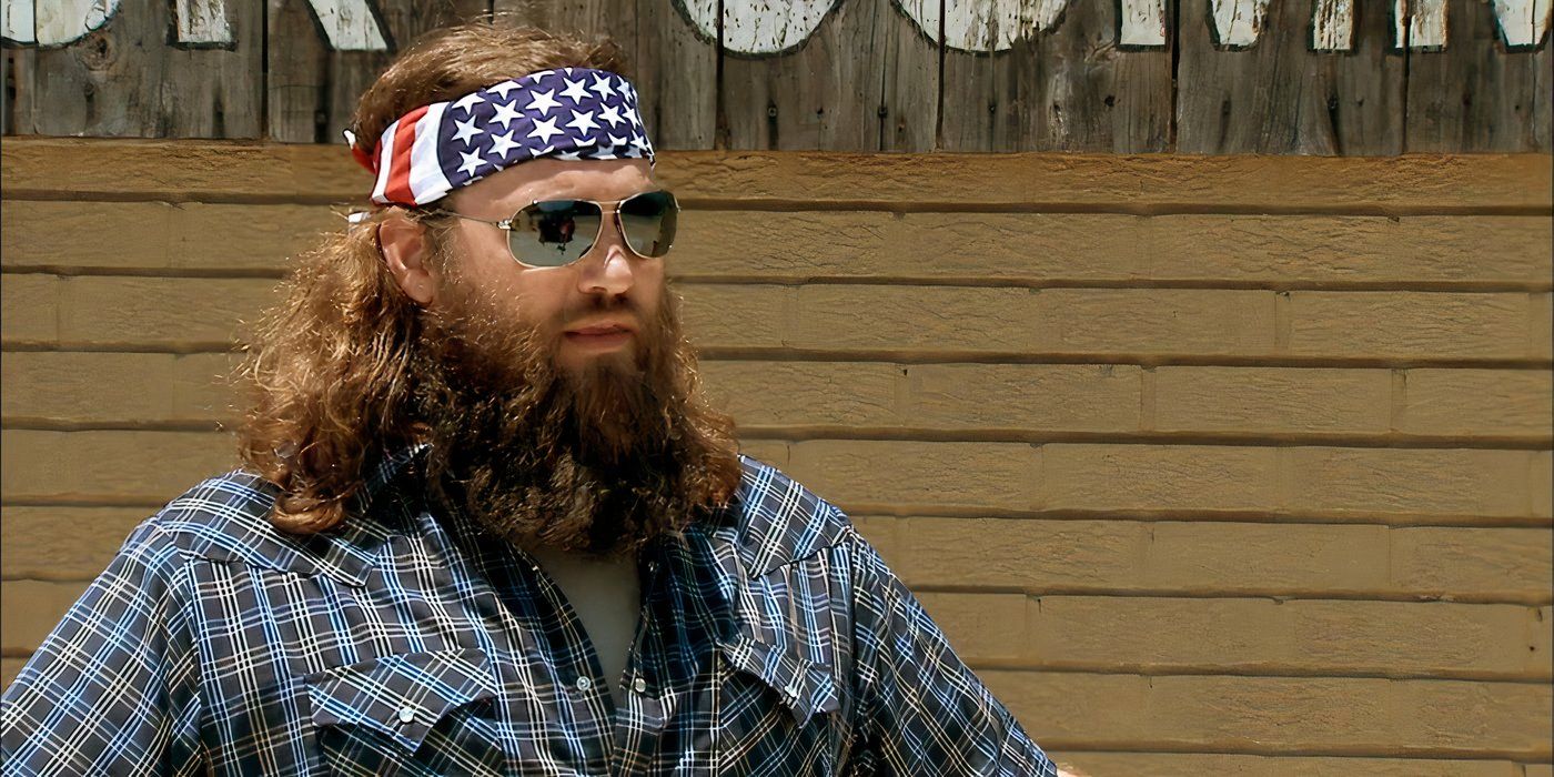 Willie Robertson wearing sunglasses and an American flag bandana in Duck Dynasty.